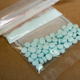 Tablets believed to be laced with fentanyl are displayed at the Drug Enforcement Administration Northeast Regional Laboratory on October 8, 2019 in New York.